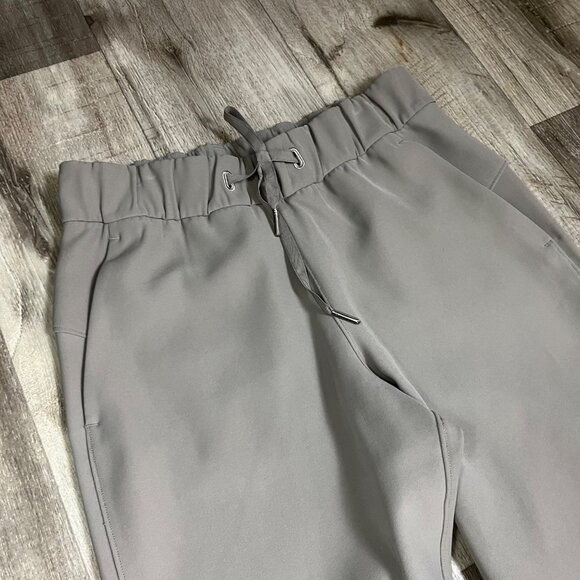 Lululemon Athletic On The Fly 7/8 Pants Woven Grey Sage Women’s Size 4 - Picture 3 of 9